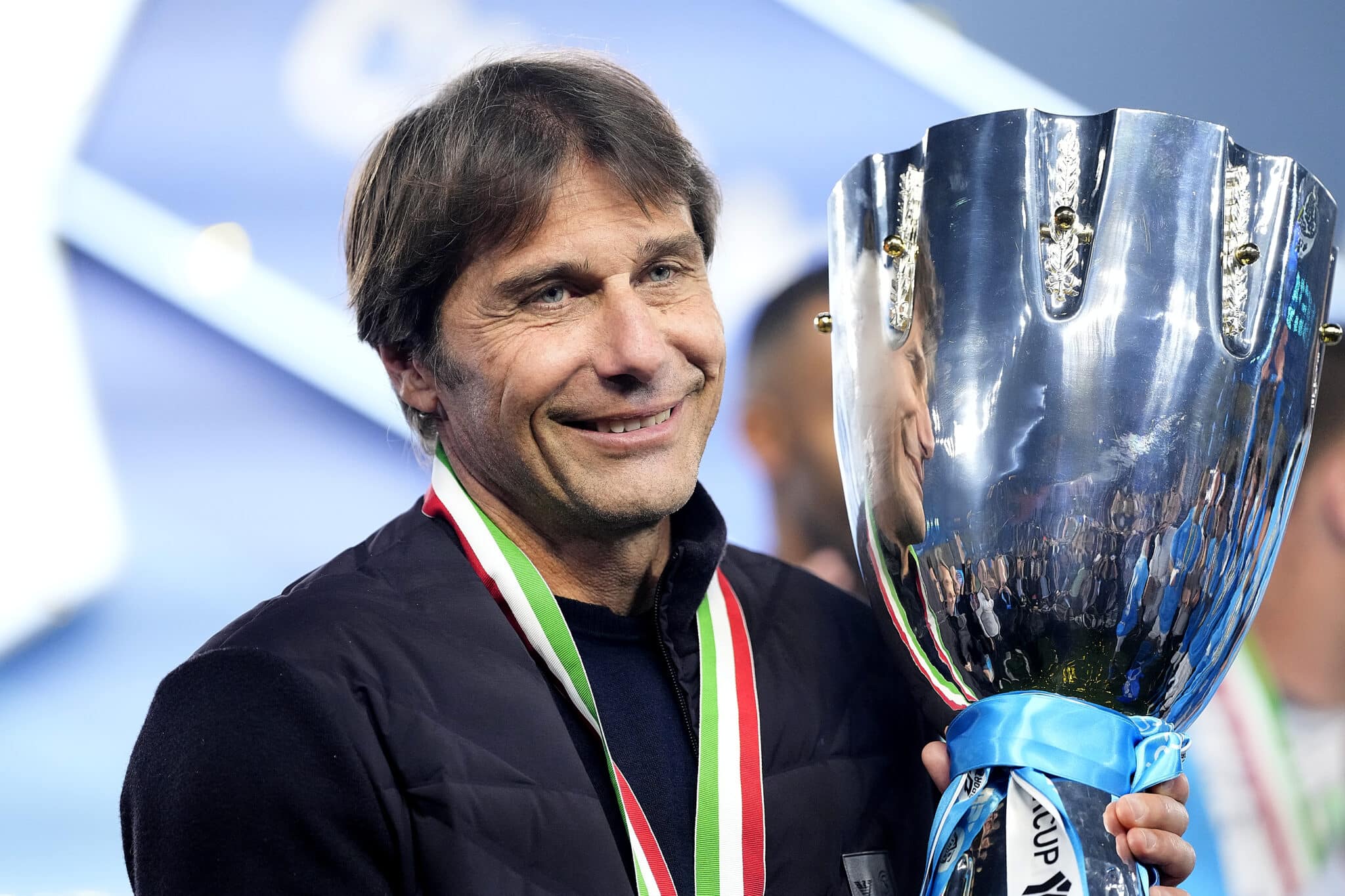RIYADH, SAUDI ARABIA - DECEMBER 22: Antonio Conte head coach of Napoli poses with the Supercoppa trophy during the Supercoppa Italiana final match between SSC Napoli v Bologna FC 1909 at King Saud University Stadium on December 22, 2025 in Riyadh, Saudi Arabia. (Photo by Jose Breton/Pics Action/NurPhoto via Getty Images)