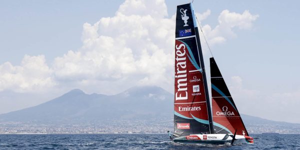 NAPLES, CAMPANIA, ITALY - 2026/07/07: Emirates Team New Zealand testing its "one-design" AC40 boatfeaturing identical technical specifications and capable of speeds exceeding 40 knotsin the waters of the Gulf of Naples, with Mount Vesuvius in the background. The 38th edition of the America's Cup (sponsored by Louis Vuitton) is scheduled for 2027. (Photo by Salvatore Laporta/KONTROLAB/LightRocket via Getty Images)