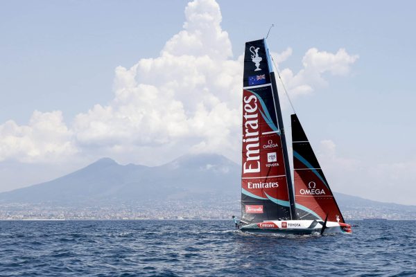NAPLES, CAMPANIA, ITALY - 2026/07/07: Emirates Team New Zealand testing its "one-design" AC40 boatfeaturing identical technical specifications and capable of speeds exceeding 40 knotsin the waters of the Gulf of Naples, with Mount Vesuvius in the background. The 38th edition of the America's Cup (sponsored by Louis Vuitton) is scheduled for 2027. (Photo by Salvatore Laporta/KONTROLAB/LightRocket via Getty Images)