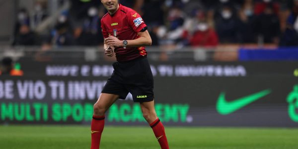MILAN, ITALY - FEBRUARY 08: The referee Marco Di Bello smiles during the Coppa Italia match between FC Internazionale and AS Roma at Stadio Giuseppe Meazza on February 08, 2022 in Milan, Italy. (Photo by Jonathan Moscrop/Getty Images)