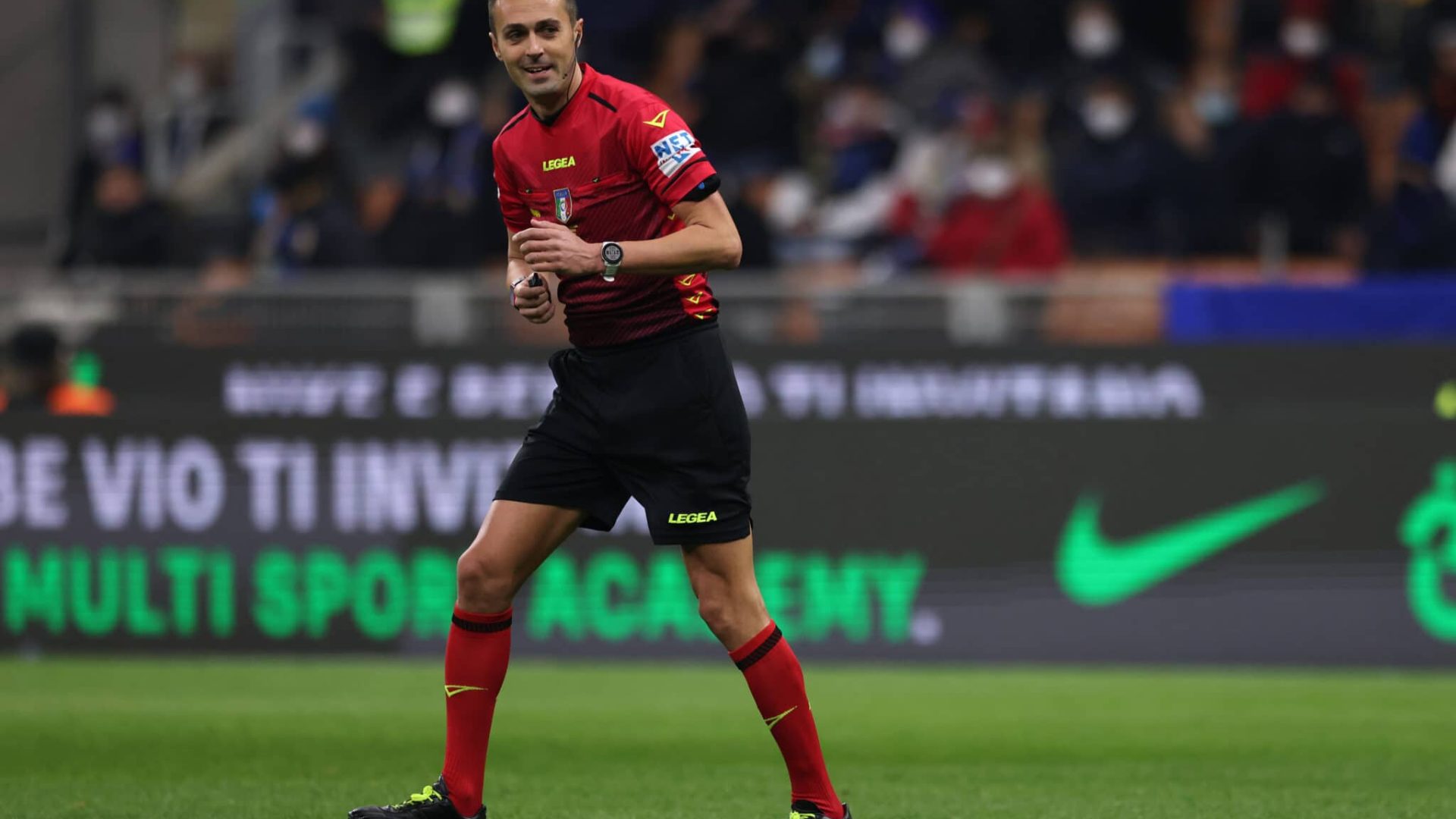 MILAN, ITALY - FEBRUARY 08: The referee Marco Di Bello smiles during the Coppa Italia match between FC Internazionale and AS Roma at Stadio Giuseppe Meazza on February 08, 2022 in Milan, Italy. (Photo by Jonathan Moscrop/Getty Images)