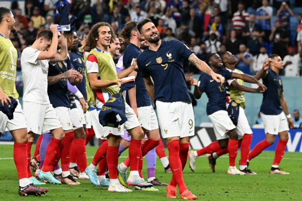 France players celebrate with supporters after France won the Qatar 2022 World Cup Group D football match against Australia at the Al-Janoub Stadium in Al-Wakrah, south of Doha on November 22, 2022. (Photo by Chandan KHANNA / AFP) (Photo by CHANDAN KHANNA/AFP via Getty Images)