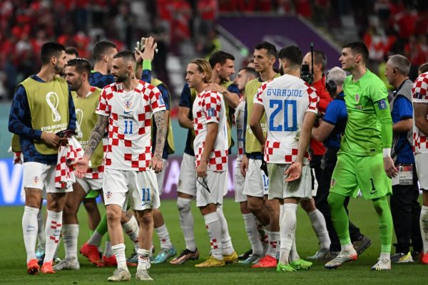 Croatia's players celebrate after defeating Canada 4-1 in the Qatar 2022 World Cup Group F football match between Croatia and Canada at the Khalifa International Stadium in Doha on November 27, 2022. (Photo by OZAN KOSE / AFP) (Photo by OZAN KOSE/AFP via Getty Images)