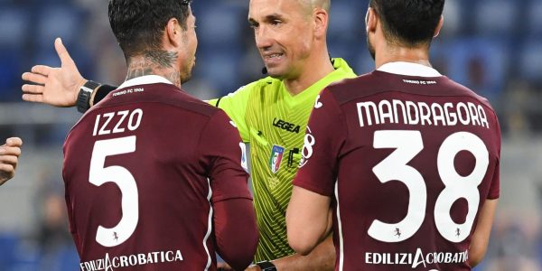 ROME, ITALY - MAY 18: Armando Izzo of Torino FC and Rolando Mandragora of Torino FC protest with the referee Micheal Fabbri  during the Serie A match between SS Lazio  and Torino FC at Stadio Olimpico on May 18, 2021 in Rome, Italy. The match, despite it's not postponed by Lega Serie A,  will not be played as Torino team need to observe a home quarantine until midnight on Tuesday due to Covd-19. (Photo by Silvia Lore/Getty Images)