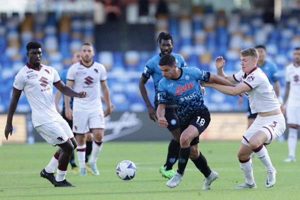 Giovanni Simeone of SSC Napoli and Perr Schuurs of Torino FC during the Serie A football match between SSC Napoli and Torino FC at Diego Armando Maradona stadium in Napoli (Italy), October 01st, 2022 (Photo by Cesare Purini/Mondadori Portfolio via Getty Images)