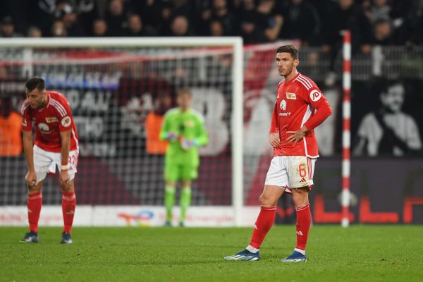 BERLIN, GERMANY - NOVEMBER 04: Robin Gosens of 1.FC Union Berlin looks dejected as Nacho Ferri of Eintracht Frankfurt (not pictured) scores the team's third goal during the Bundesliga match between 1. FC Union Berlin and Eintracht Frankfurt at An der Alten Foersterei on November 04, 2023 in Berlin, Germany. (Photo by Luciano Lima/Getty Images)
