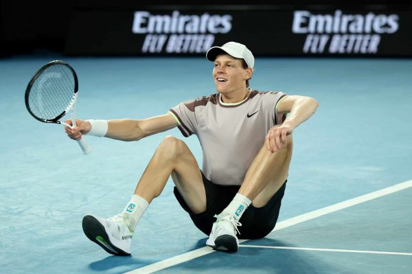 MELBOURNE, AUSTRALIA - JANUARY 28: Jannik Sinner of Italy celebrates winning championship point in their Men's Singles Final match against Daniil Medvedev during the 2024 Australian Open at Melbourne Park on January 28, 2024 in Melbourne, Australia. (Photo by Daniel Pockett/Getty Images)