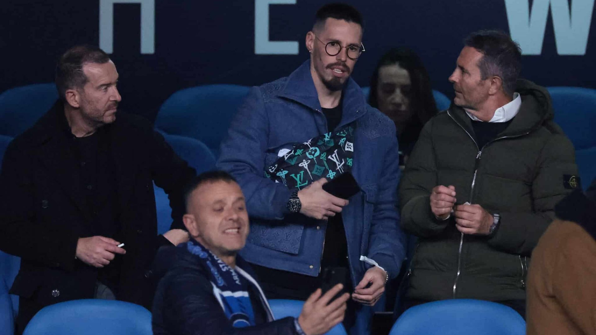 NAPLES, ITALY - FEBRUARY 21: Former Napoli player Marek Hamsik (C) in the tribune looks on prior to kick off in the UEFA Champions League 2023/24 round of 16 first leg match between SSC Napoli and FC Barcelona at Stadio Diego Armando Maradona on February 21, 2024 in Naples, Italy. (Photo by Jonathan Moscrop/Getty Images)