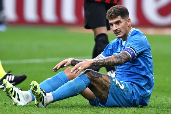 MILAN, ITALY - SEPTEMBER 28:  Giovanni Di Lorenzo of Napoli react with disappointment during the Serie A match between AC Milan and SSC Napoli at Giuseppe Meazza Stadium on September 28, 2025 in Milan, Italy. (Photo by Image Photo Agency/Getty Images)