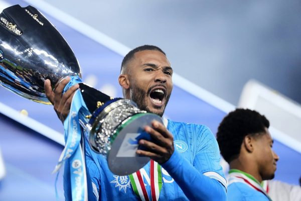 RIYADH, SAUDI ARABIA - DECEMBER 22: David Neres right winger of Napoli and Brazil poses with the Supercoppa trophy during the Supercoppa Italiana final match between SSC Napoli v Bologna FC 1909 at King Saud University Stadium on December 22, 2025 in Riyadh, Saudi Arabia. (Photo by Jose Breton/Pics Action/NurPhoto via Getty Images)