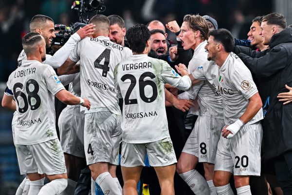 GENOA, ITALY - FEBRUARY 7: Scott McTominay of Napoli (4th from right) celebrates with his team-mates after scoring a goal during the Serie A match between Genoa CFC and SSC Napoli at Stadio Luigi Ferraris on February 7, 2026 in Genoa, Italy. (Photo by Simone Arveda/Getty Images)