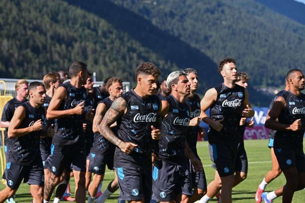 DIMARO, ITALY - JULY 18: Giovanni Di Lorenzo of Napoli jogs with teammates during a Napoli training session on July 18, 2025 in Dimaro, Italy. (Photo by SSC NAPOLI/SSC NAPOLI via Getty Images)