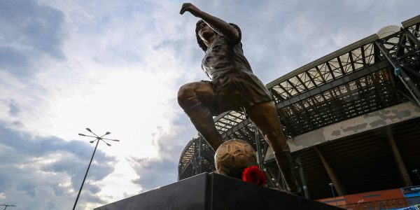 NAPLES, ITALY - 2021/11/25: The statue of Diego Armando Maradona, by the sculptor Domenico Sepe,  in front of the Diego Armando Maradona stadium. (Photo by Marco Cantile/LightRocket via Getty Images)
