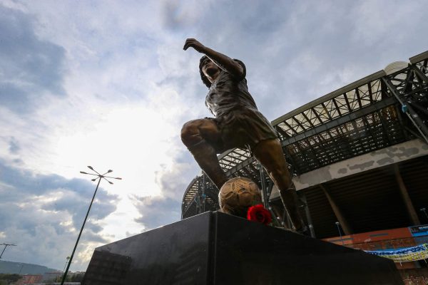 NAPLES, ITALY - 2021/11/25: The statue of Diego Armando Maradona, by the sculptor Domenico Sepe,  in front of the Diego Armando Maradona stadium. (Photo by Marco Cantile/LightRocket via Getty Images)