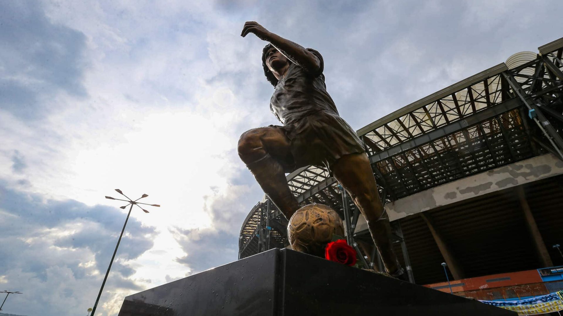 NAPLES, ITALY - 2021/11/25: The statue of Diego Armando Maradona, by the sculptor Domenico Sepe,  in front of the Diego Armando Maradona stadium. (Photo by Marco Cantile/LightRocket via Getty Images)