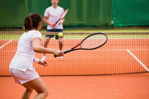 tennisplayersplayingamatchonthecourtona.jpg
